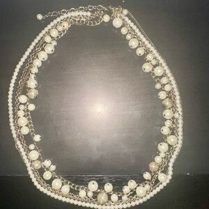 White Multi-Strand Pearl Necklace with Intricate Design